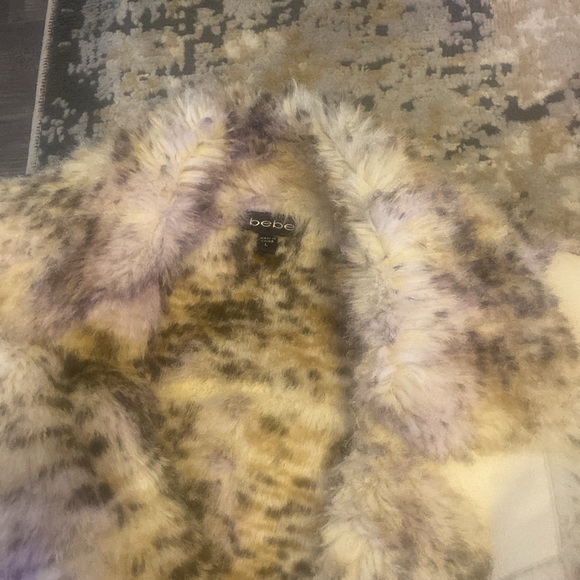 Bebe coat that is very stylish and sexy.  Nice and warm inside.  Great coat! - Picture 2 of 4